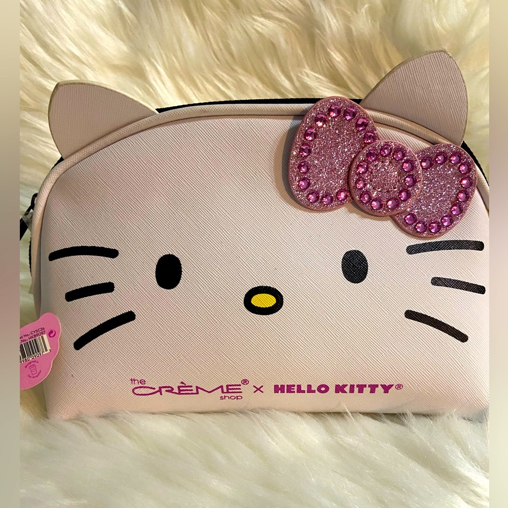 The creme shop Hello kitty cosmetic bag with bow rhinestones New